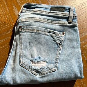 Buckle Black skinny jeans.